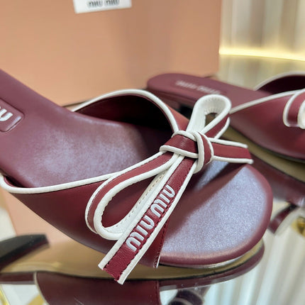 SLIDES SANDALS IN BURGUNDY RED CALFSKIN BOW IN TRAP