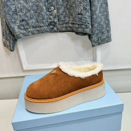 TRIANGLE LOGO MULES IN BRONZE BROWN SUEDE AND SHEARLING LINING