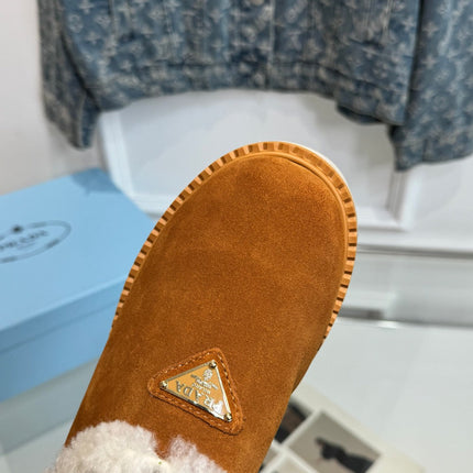 TRIANGLE LOGO MULES IN BRONZE BROWN SUEDE AND SHEARLING LINING