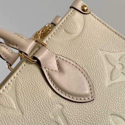 LV 25S ONTHEGO EAST WEST BAG 25 IN CREAM CALFSKIN MONOGRAM EMPREINTE