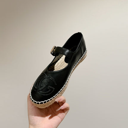 GG CROSS STRAP FLAT SHOES IN BLACK CALFSKIN WITH STRAW SOLE