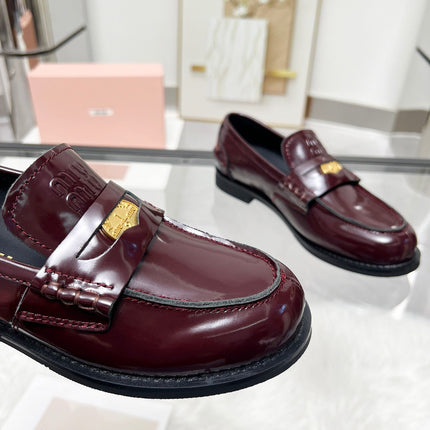 PENNY LOAFERS IN BURGUNDY RED GLOOSY CALFSKIN