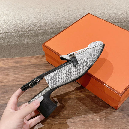 INFINIE 50 PUMP BLACK AND WHITE LAMBSKIN