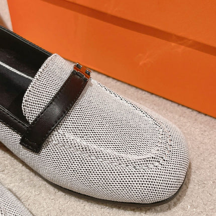 INFINIE 50 PUMP BLACK AND WHITE LAMBSKIN