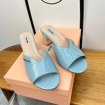 JEWELLED HEEL 55 MULE SANDALS IN LIGHT BLUE CALFSKIN