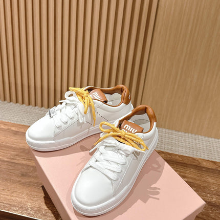 MM SNEAKERS IN WHITE CALFSKIN WITH YELLOW LACES