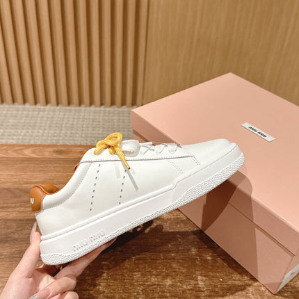 MM SNEAKERS IN WHITE CALFSKIN WITH YELLOW LACES