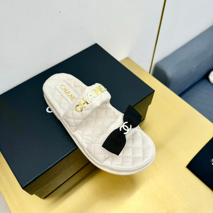 DAD SANDALS WITH BOW IN WHITE LAMBSKIN MULE