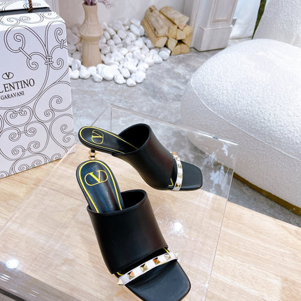 ROCKSTUD TOWER-HEEL MULES IN BLACK CALFSKIN 7 CM