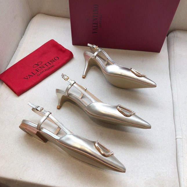 VLOGO SIGNATURE SILVER PATENT LEATHER SLINGBACK PUMP