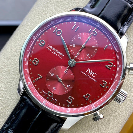 PORTUGIESER AUTOMATIC 40 MM WATCH SILVER CASE WITH BLACK LEATHER STRAP AND CHERRY RED DIAL
