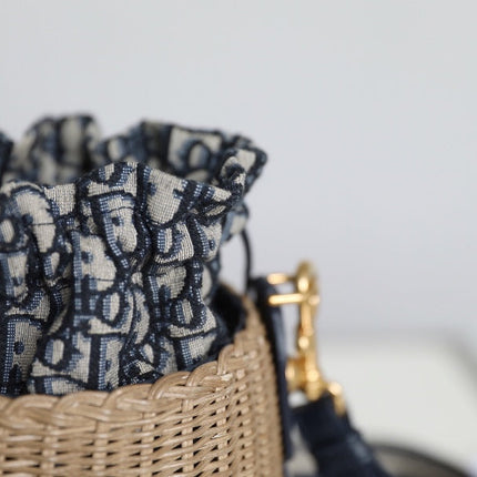 BUCKET BAG 19 IN BLACK OBLIQUE JACQUARD AND BEIGE WICKER