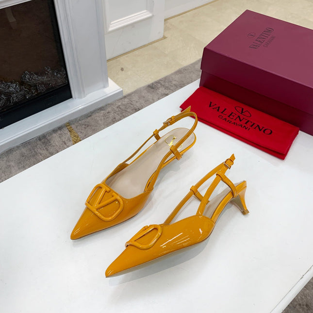 VLOGO SIGNATURE MUSTARD YELLOW PATENT LEATHER SLINGBACK PUMP