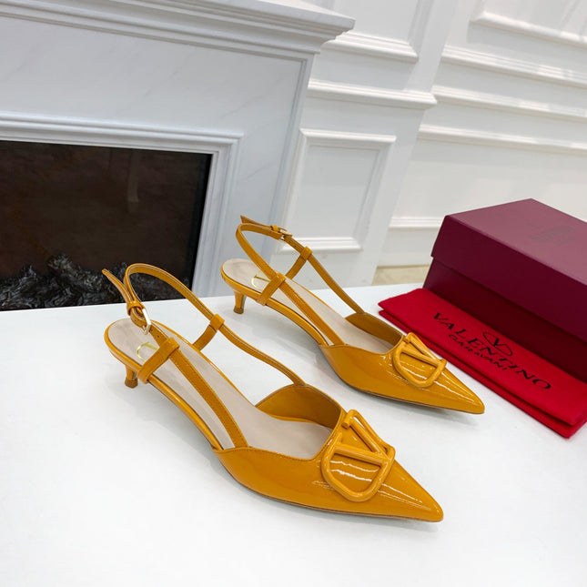 VLOGO SIGNATURE MUSTARD YELLOW PATENT LEATHER SLINGBACK PUMP