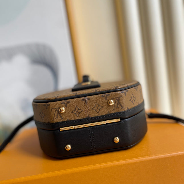 LV 25S PETITE BOITE CHAPEAU 17 IN BLACK MONOGRAM REVERSE CALFSKIN