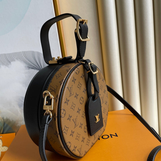 LV 25S PETITE BOITE CHAPEAU 17 IN BLACK MONOGRAM REVERSE CALFSKIN