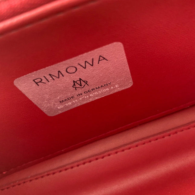 RIMOWA 20 CASE BAG IN LIGHT PINK ALUMINUM MAGNESIUM