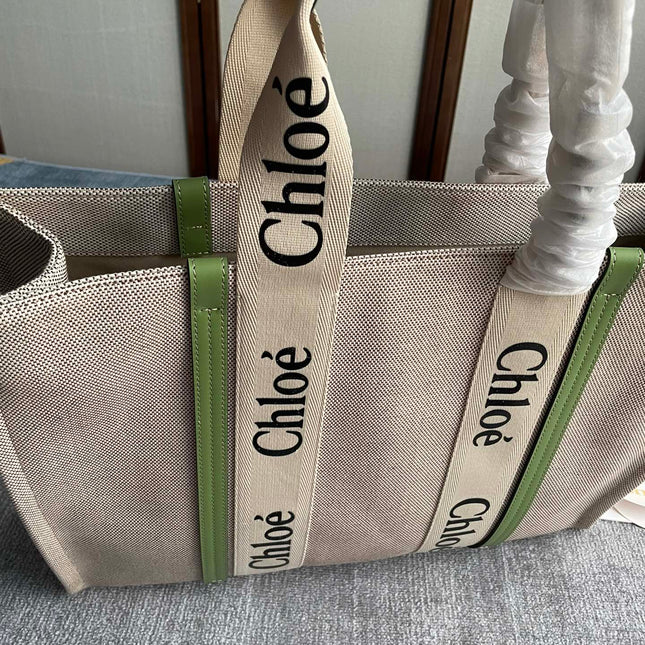 LAGRE WOODY TOTE BAG 45 IN BEIGE LINEN CANVAS BLACK WEBBING LOGO EMBROIDER GREEN CALFSKIN