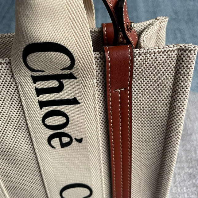 SMALL STRAP WOODY TOTE BAG 26.5 IN BEIGE LINEN CANVAS BLACK WEBBING LOGO EMBROIDER BROWN CALFSKIN