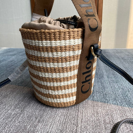 SMALL WOODY BASKET 17 IN BROWN AND WHITE FIBERS BROWN WEBBING BLACK CALFSKIN