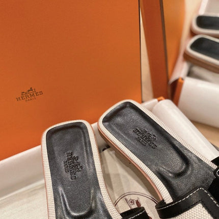 0RAN SANDALS IN BLACK CALFSKIN AND WHITE CANVAS