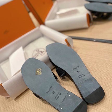 0RAN SANDALS IN BLACK CALFSKIN AND CANVAS