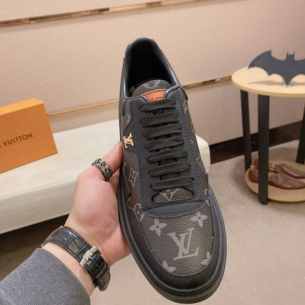 LV TRAINER IN BLACK MIX DARK BROWN CALFSKIN