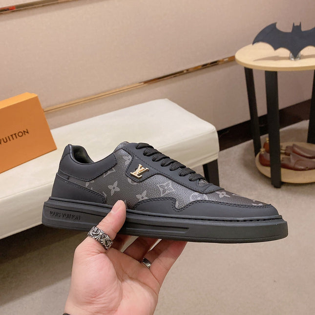 LV TRAINER IN BLACK MIX DARK BROWN CALFSKIN