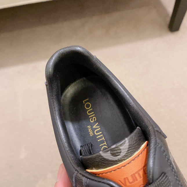 LV TRAINER IN BLACK MIX DARK BROWN CALFSKIN
