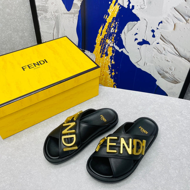 FENDI GRAPHY LOGO LETTERING SLIDES IN BLACK LAMBSKIN WITH GOLD HARDWARE