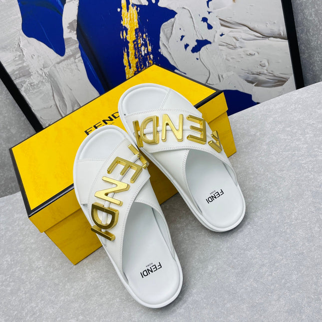 FENDI GRAPHY LOGO LETTERING SLIDES IN WHITE LAMBSKIN WITH GOLD HARDWARE