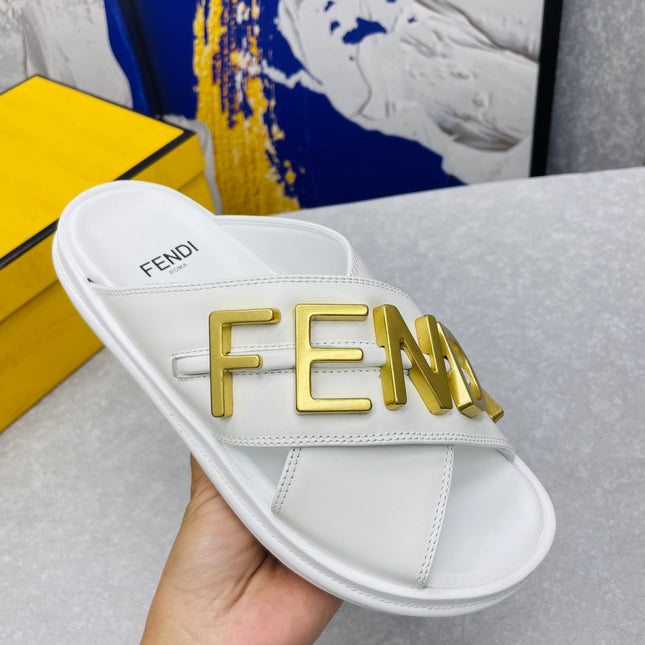 FENDI GRAPHY LOGO LETTERING SLIDES IN WHITE LAMBSKIN WITH GOLD HARDWARE