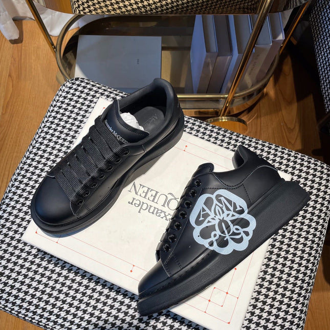 OVERSIZED SNEAKERS IN BLACK CALFSKIN WITH WHITE MONOGRAM LOGO