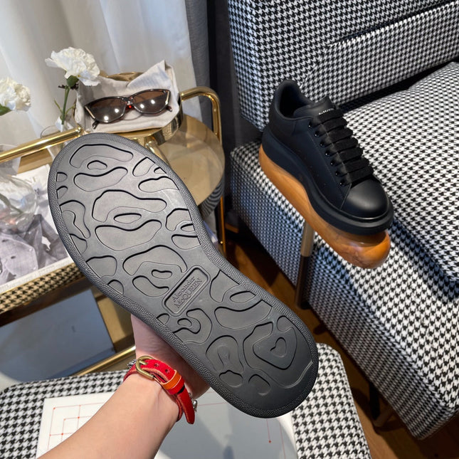 OVERSIZED SNEAKERS IN BLACK CALFSKIN WITH WHITE MONOGRAM LOGO