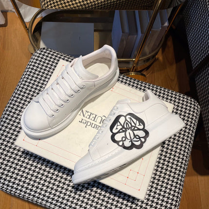 OVERSIZED SNEAKERS IN WHITE CALFSKIN WITH BLACK MONOGRAM LOGO