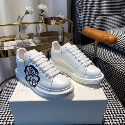 OVERSIZED SNEAKERS IN WHITE CALFSKIN WITH BLACK MONOGRAM LOGO