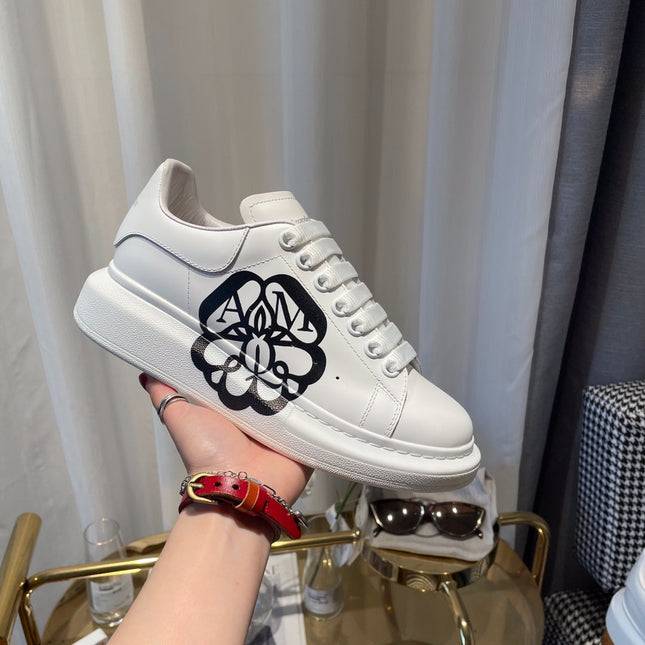 OVERSIZED SNEAKERS IN WHITE CALFSKIN WITH BLACK MONOGRAM LOGO