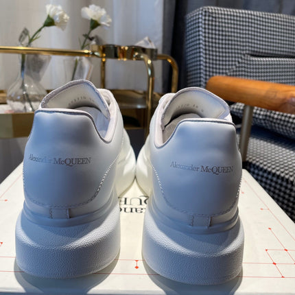 OVERSIZED SNEAKERS IN WHITE CALFSKIN WITH BLACK MONOGRAM LOGO