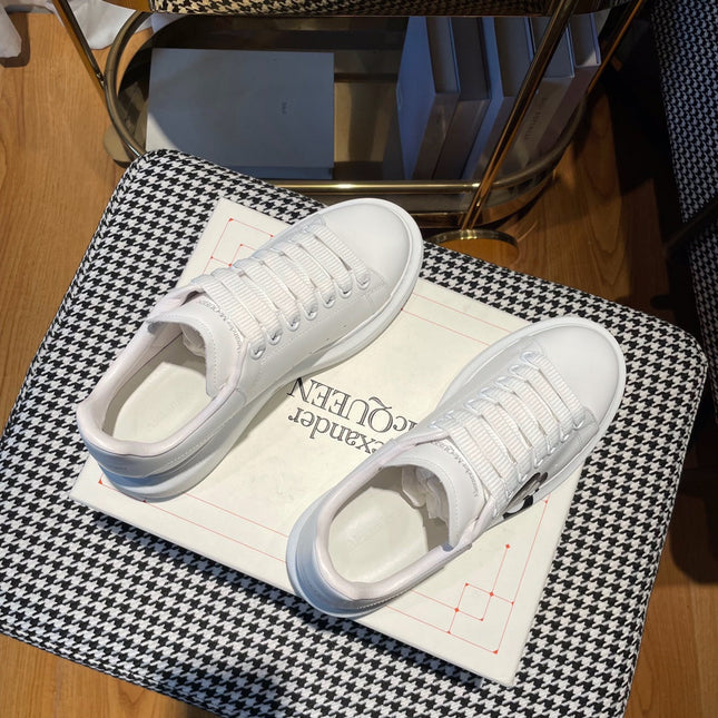 OVERSIZED SNEAKERS IN WHITE CALFSKIN WITH BLACK MONOGRAM LOGO