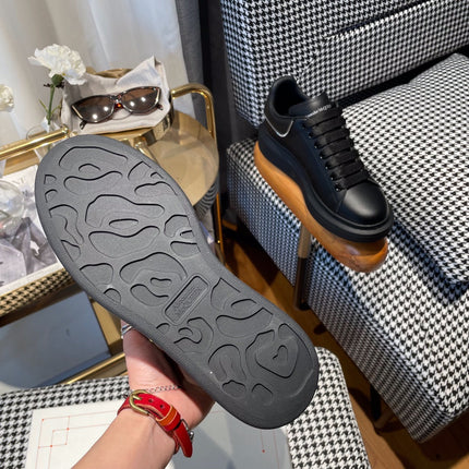 OVERSIZED SNEAKERS IN BLACK CALFSKIN WITH ZIPPER DETAIL AND SILVER LOGO HEEL