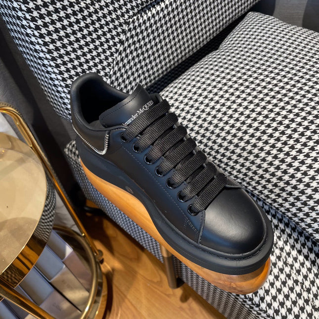 OVERSIZED SNEAKERS IN BLACK CALFSKIN WITH ZIPPER DETAIL AND SILVER LOGO HEEL