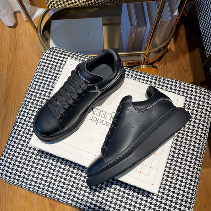 OVERSIZED SNEAKERS IN BLACK CALFSKIN WITH ZIPPER DETAIL AND SILVER LOGO HEEL