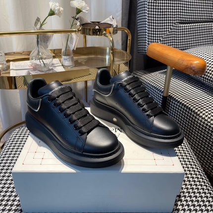 OVERSIZED SNEAKERS IN BLACK CALFSKIN WITH ZIPPER DETAIL AND SILVER LOGO HEEL