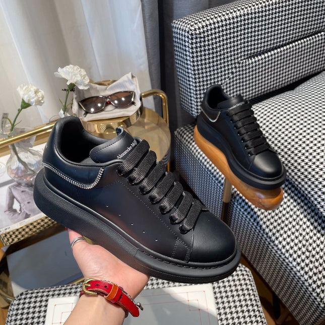 OVERSIZED SNEAKERS IN BLACK CALFSKIN WITH ZIPPER DETAIL AND SILVER LOGO HEEL