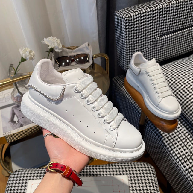 OVERSIZED SNEAKERS IN WHITE CALFSKIN WITH ZIPPER DETAIL AND SILVER LOGO HEEL