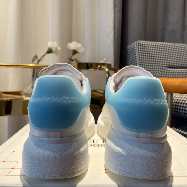 OVERSIZED SNEAKERS IN WHITE CALFSKIN WITH BLUE RUBBER HEEL TAB