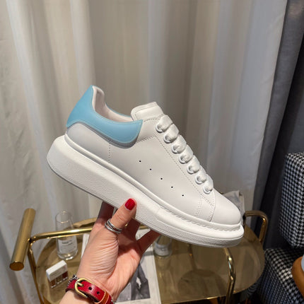 OVERSIZED SNEAKERS IN WHITE CALFSKIN WITH BLUE RUBBER HEEL TAB