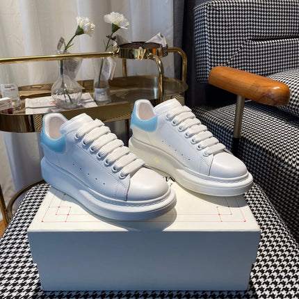 OVERSIZED SNEAKERS IN WHITE CALFSKIN WITH BLUE RUBBER HEEL TAB