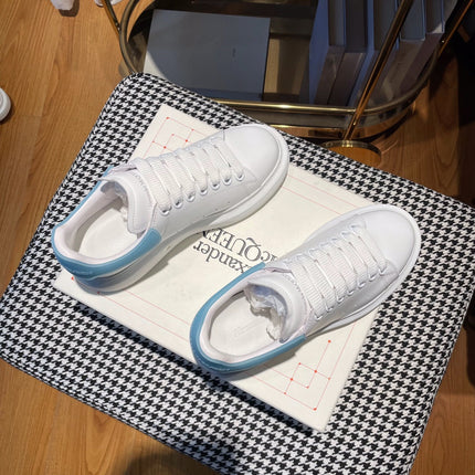 OVERSIZED SNEAKERS IN WHITE CALFSKIN WITH BLUE RUBBER HEEL TAB