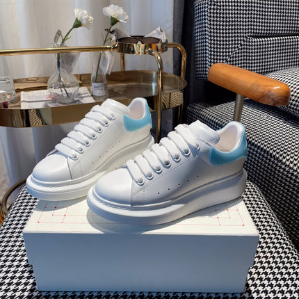 OVERSIZED SNEAKERS IN WHITE CALFSKIN WITH BLUE RUBBER HEEL TAB